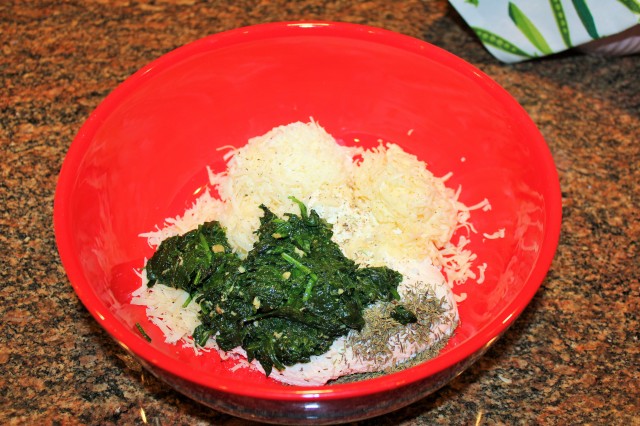 Place spinach, cheeses, etc. in large bowl